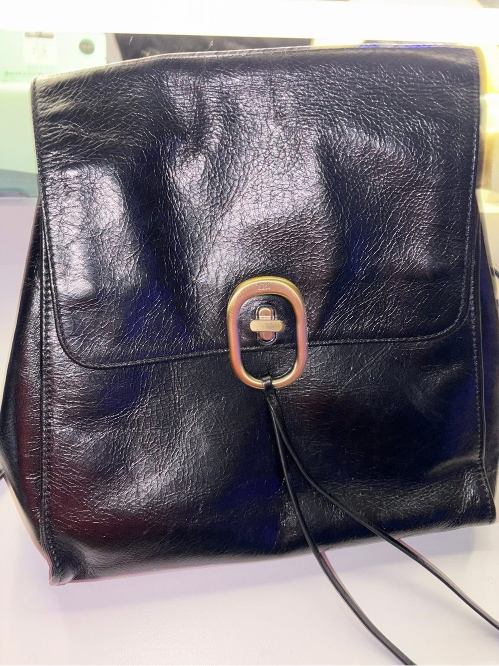 HOBO Black Leather Backpack with Gold-Tone Turnlock